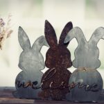 Three Rusted Bunnies Welcome Stand
